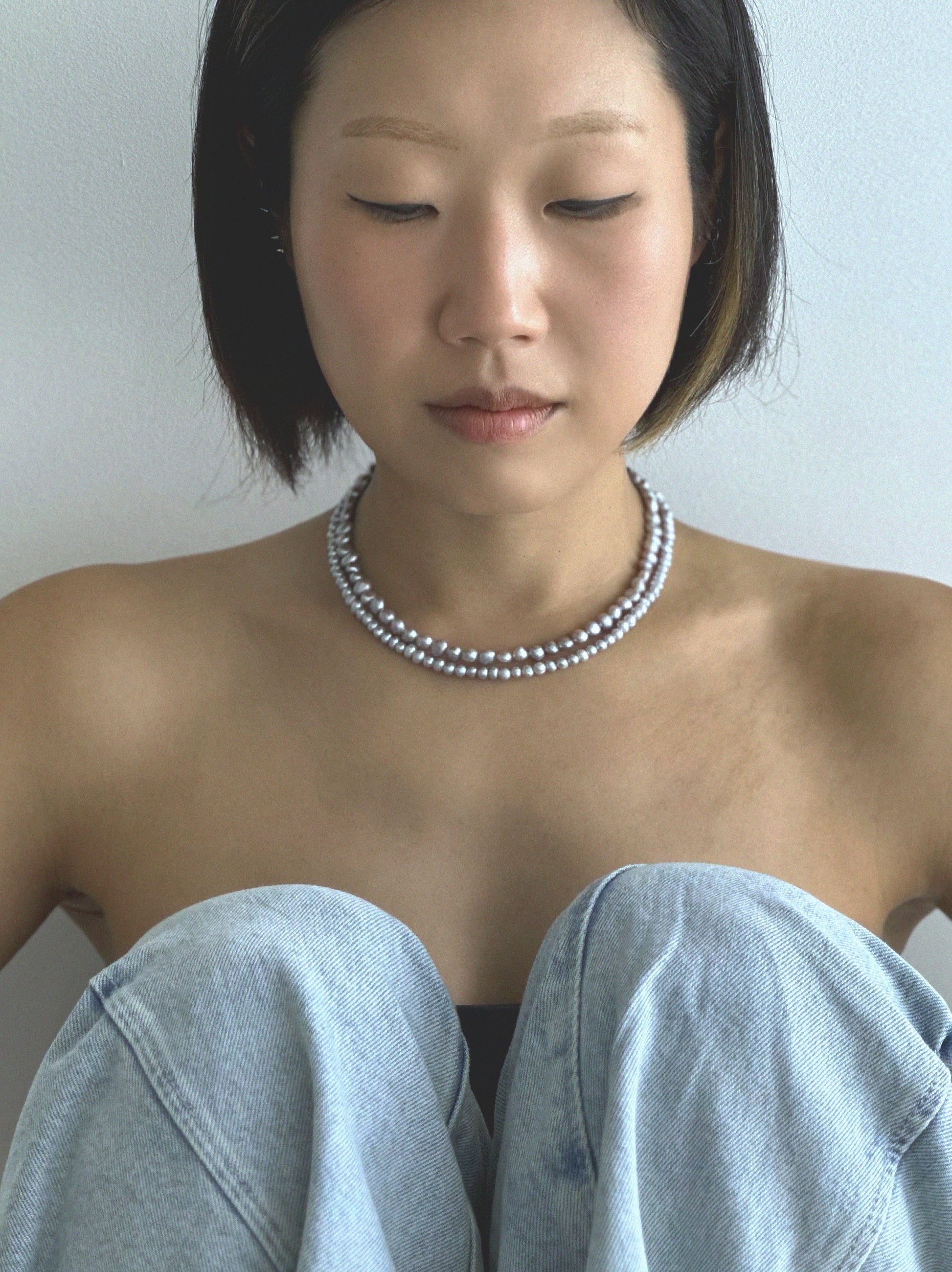 Small Abyss Necklace worn — Pryte grey freshwater pearl necklace